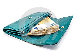 A lot of euro banknotes in a women`s wallet on a white background. Close-up.