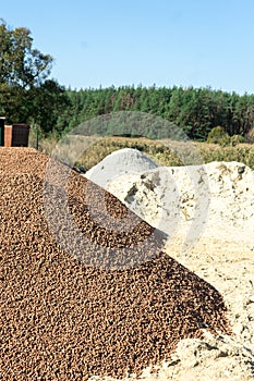 A lot of expanded clay in a pile on the construction site