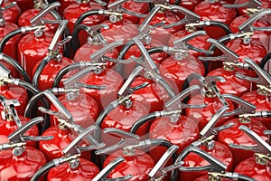 A lot of fire extinguishers. Protection and security concept background