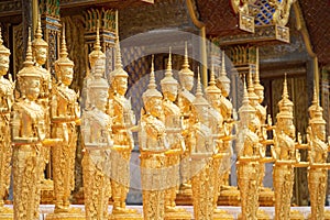 A Lot of Golden Statue standing in the temple