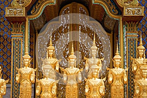 A Lot of Golden Statue standing in the temple