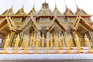 A Lot of Golden Statue standing in the temple