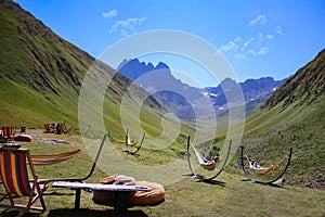 A lot of hammocks on the greenmeadow in the mountain canyon, juta,geogia