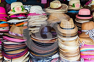 Lot of hats lie on the table