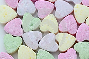 a lot of heart-shaped candies as a background, studio shooting 2