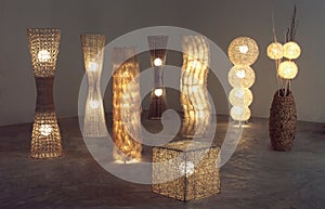 A lot of lighten floor lamps which made of rattan, bamboo and dried water hyacinth