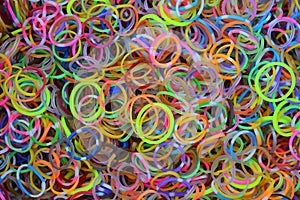 A lot of loombands making bracelets