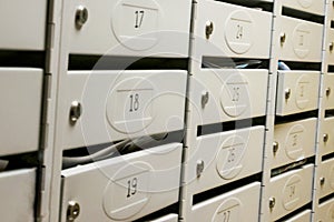 A lot of mailboxes in an apartment building. Selective focus.