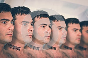 A lot of men in a row with barcode - genetic clone concept