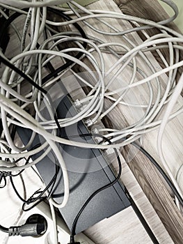 A lot of messy network cables, switch, power cables