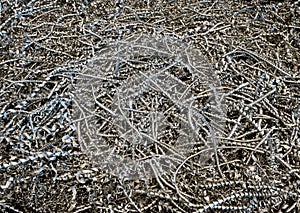 A lot of metal shavings close-up. Metal shavings abstract texture