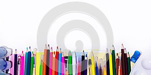 A lot of multi-colored school and office supplies on a white background - Banner. Back to school. Copyspace for text