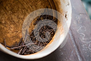 A lot of nail rust in white box