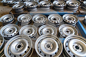 A lot of new stamped metal wheels for cars