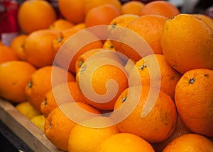 A lot of oranges on the counter