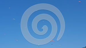 A lot of parachutists in the sky. Oludeniz paragliding. Fethiye, Oludeniz, Babadag. Paragliding in Turkey.