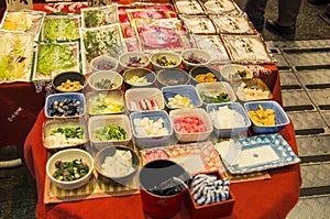 A lot of pickles on the table