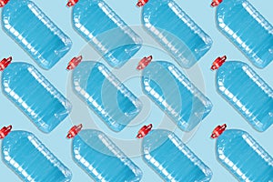 Lot of plastic bottles on a blue background. Products, packaging, storage.