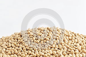 A lot of soybeans pile isolated on white background with copy space for text. Concept food for healthy. Soybean is a leguminous photo