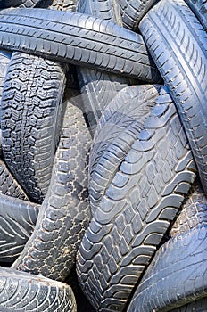 A lot of used car and truck tires
