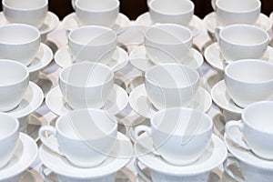A lot of white cups for coffee. Catering.