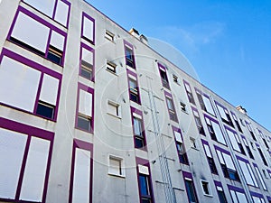 A lot of windows in the building facade