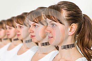 A lot of women in a row with barcode - genetic clone concept