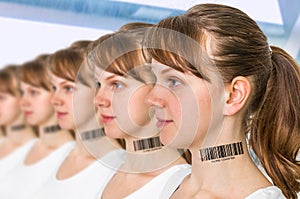 A lot of women in a row with barcode - genetic clone concept