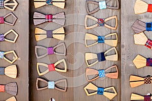 A lot of wooden bow ties.