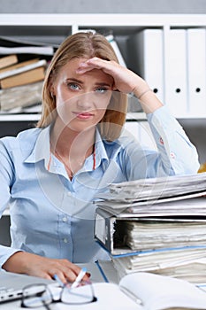 Lot of work wait for tired and exhausted woman