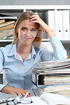 Lot of work wait for tired and exhausted woman