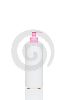 Lotion bottle with pink pump isolated on white