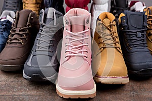 Lots of autumn or winter nubuck leather boots, concept shoes