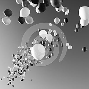 Lots of balloons flying in the sky. monochrome, black and white