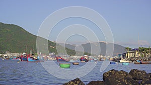 Lots of big fisherman boats in the port in Asia. Overfishing concept