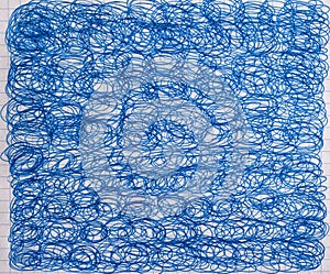 Lots of blue squiggles drawn with ballpoint pen photo