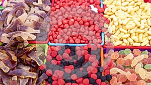 Lots of candy fruit gums, candies at the market stall