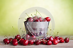 Lots of cherries on old table