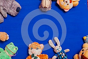 Lots of children`s toys for child development games on a blue background