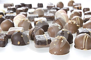 Lots of chocolate truffles - focus on front