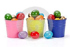 Colorful Easter eggs in buckets