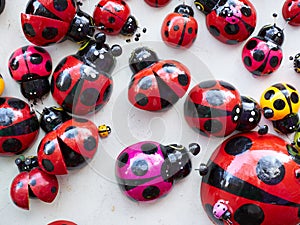 Lots of colorful wooden ladybugs.