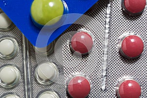 Lots of different pills on the table