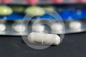 Lots of different pills on the table