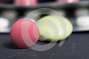 Lots of different pills on the table