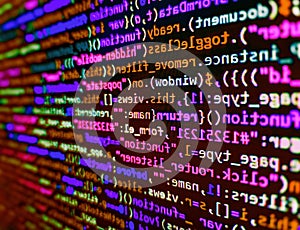 Lots of digits on the computer screen. Abstract computer script  code. Developer working on source codes on computer at office.
