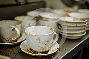 lots of empty dirty white coffee cups ,we are hiring