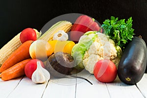 Lots of fresh seasonal vegetables on the table. Healthy food concept.