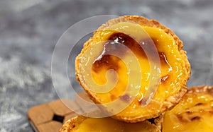 Lots of freshly baked desserts Pastel de nata or Portuguese egg tart. Pastel de Belm is a small pie with a crispy puff