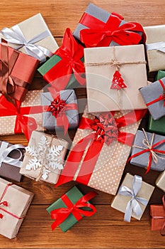 Lots of Gift boxes on wood, christmas presents in paper
